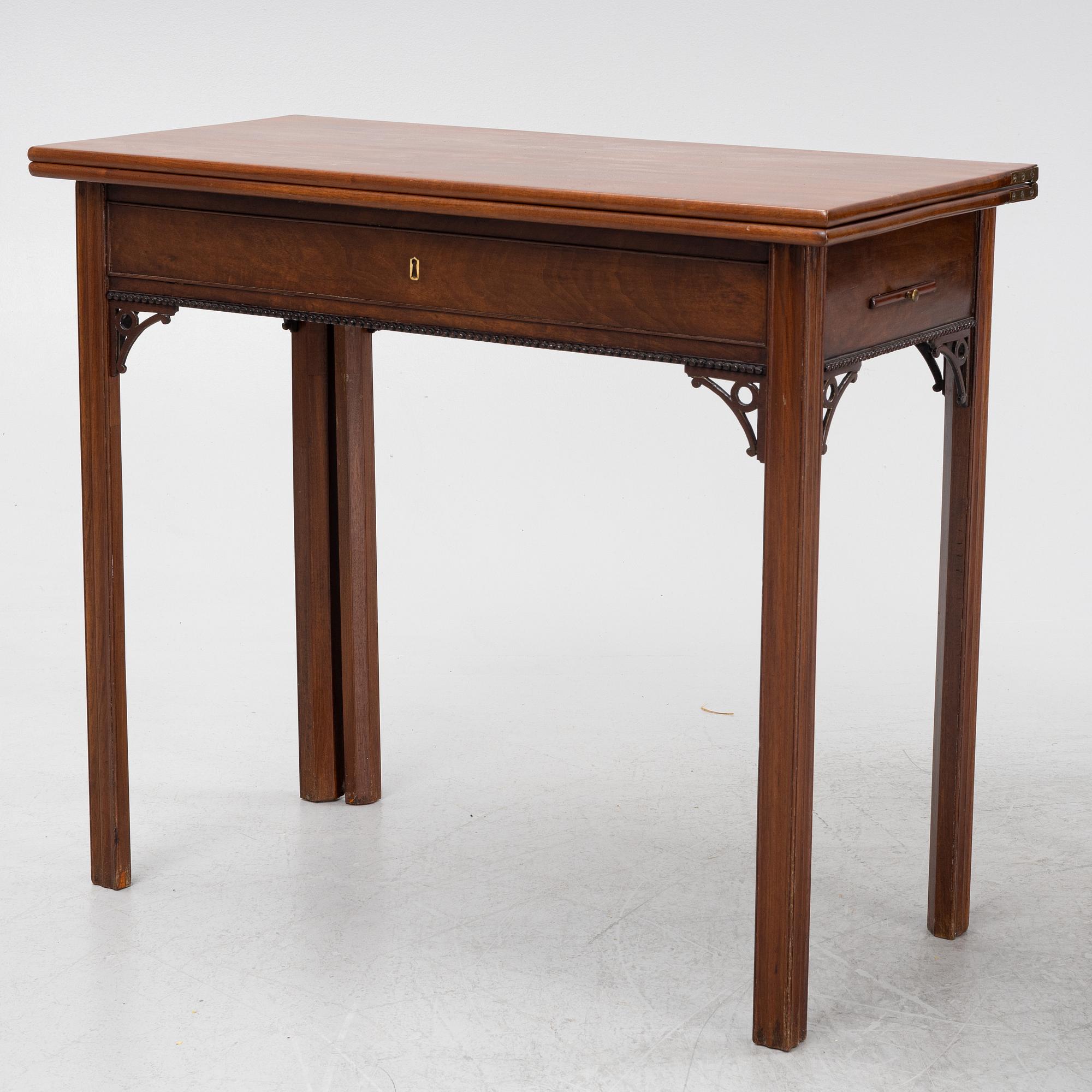 A macthed pair of late Gustavian mahogany veneered card tables one by C D Fick, Stockholm 1776-1806.
