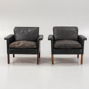 A pair of leather armchairs, Mio, Sweden, 1960's.