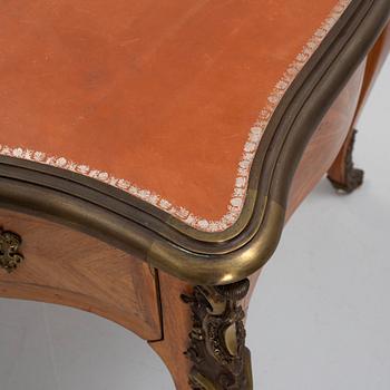 A French Louis XV-style parquetry and gilt bronze-mounted 'bureau plat', late 19th century.