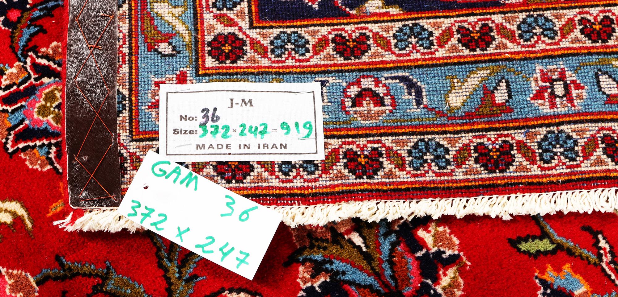 A Keshan carpet, c. 372 x 247 cm.