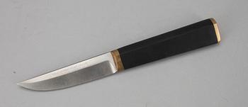 PUUKKO-KNIV, rostfritt stål, nylon och mässing, Tapio Wirkkala, Hackman Finland, formgiven 1961.