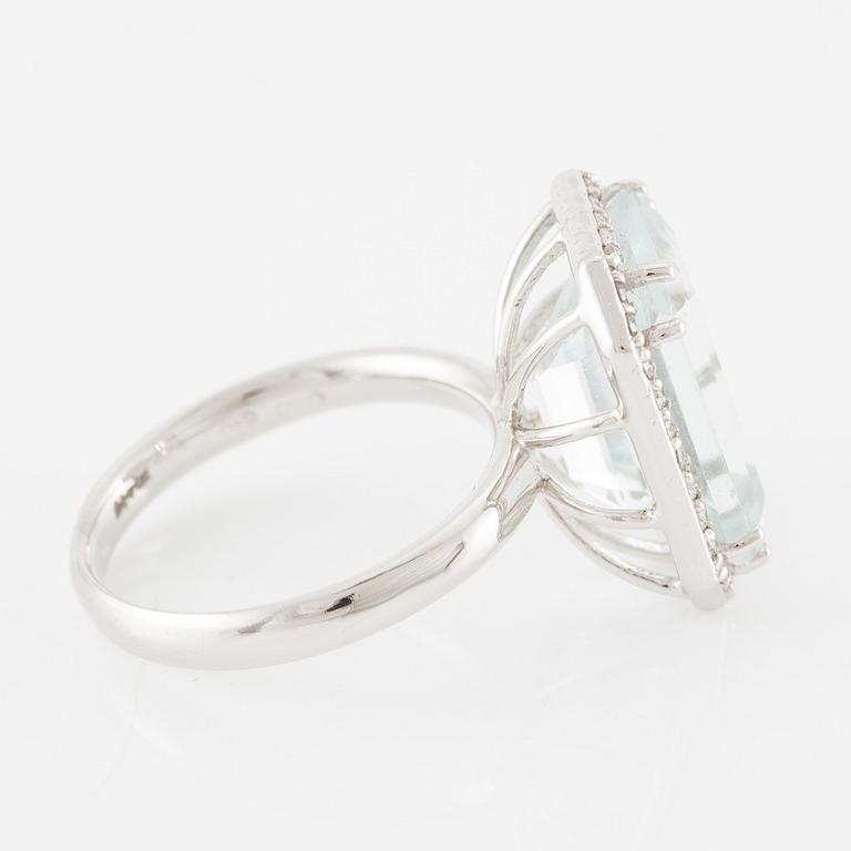 Ring, cocktail ring, 14K white gold with emerald-cut aquamarine and brilliant-cut diamonds.
