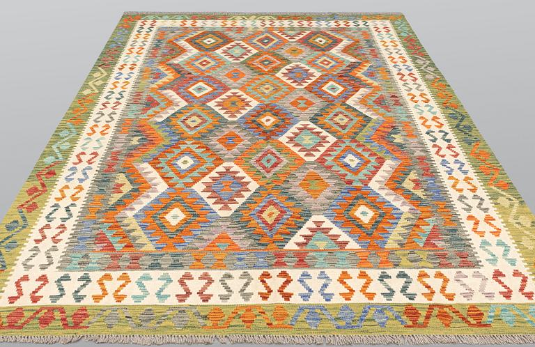 A carpet, Kilim, ca 294 x 199 cm.