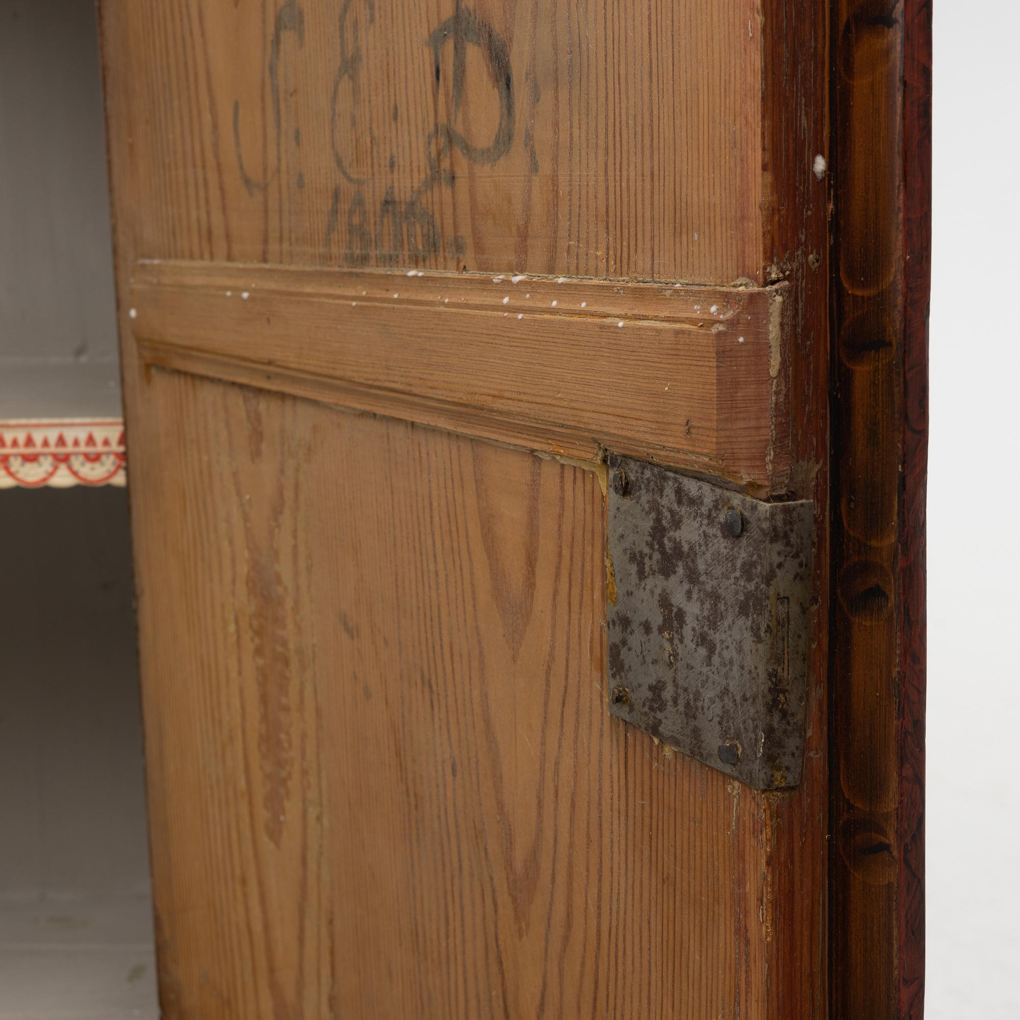A folk-art cabinet from Värmland, Sweden, dated 1806.