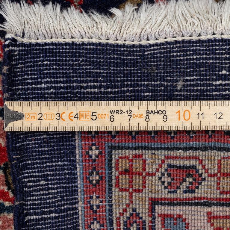 A Persian carpet, c. 445 x 320 cm.