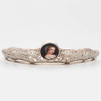 A silver and miniatyre portrait on porcelain tiara.