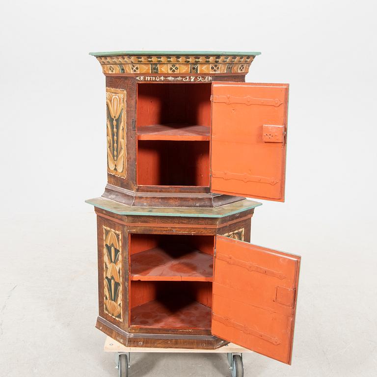 A Swedish painted corner cabinet dated 179?.