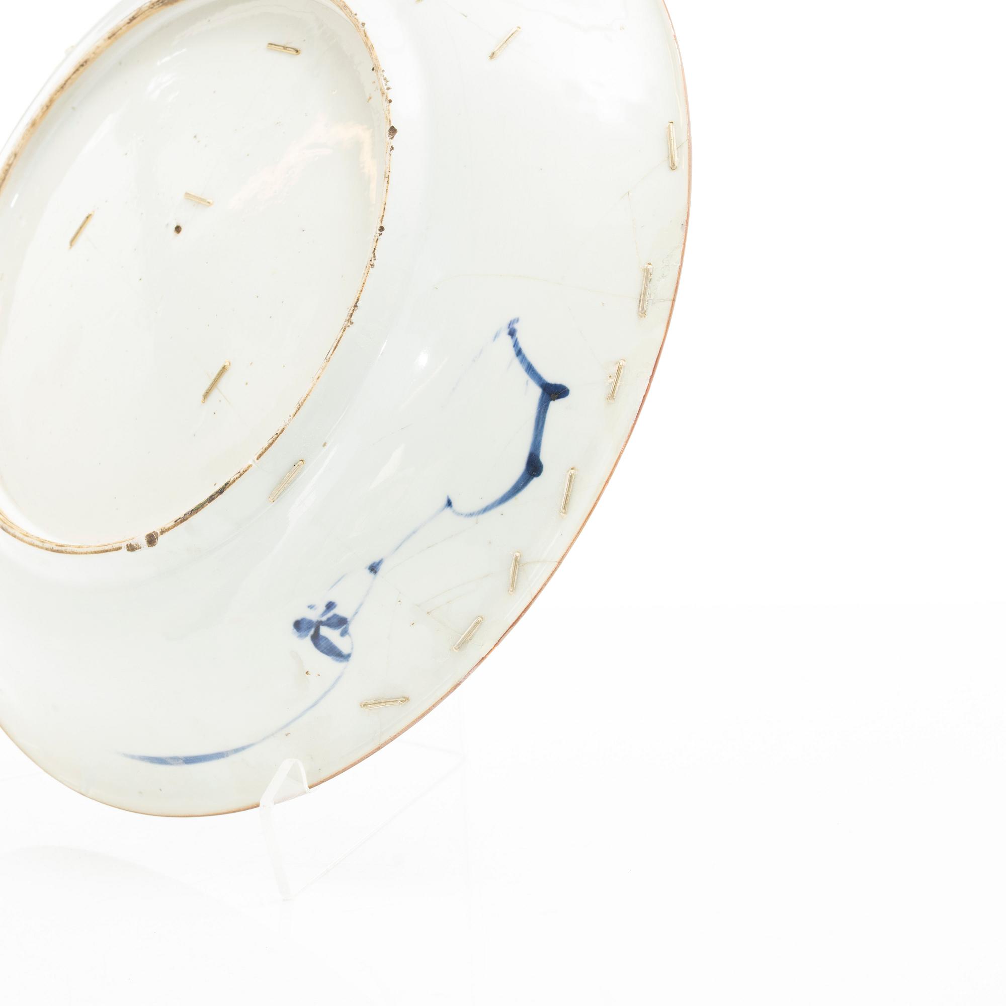 A group of three large Chinese blue and white porcelain dishes, Qing dynasty, Kangxi (1662-1722).