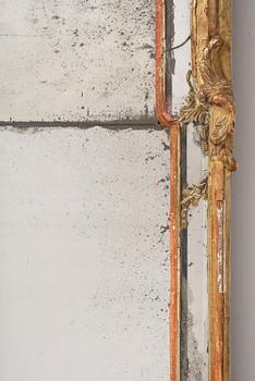 A Swedish Rococo mirror, 18 th century.