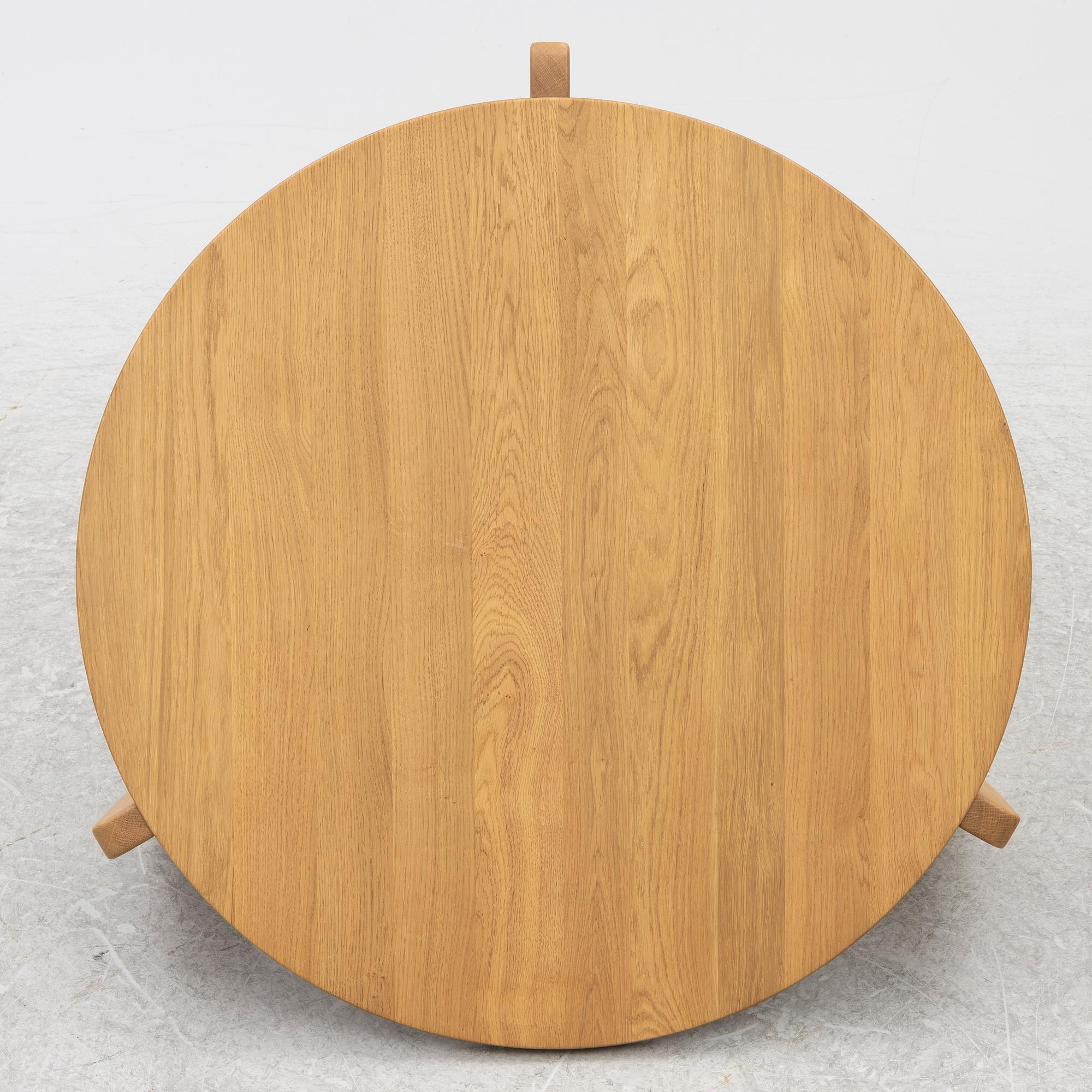 Jean Prouvé, a 'Guéridon Base' coffe table, Vitra, 21st century.