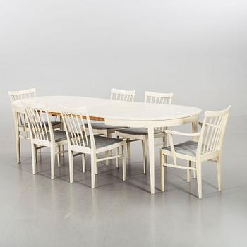 A dining group of 7 pieces by Carl Malmsten for Bodafors from the second half of the 20th century.