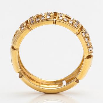 Versace, An 18K gold ring with diamonds ca. 0.12 ct in total. Marked Versace.