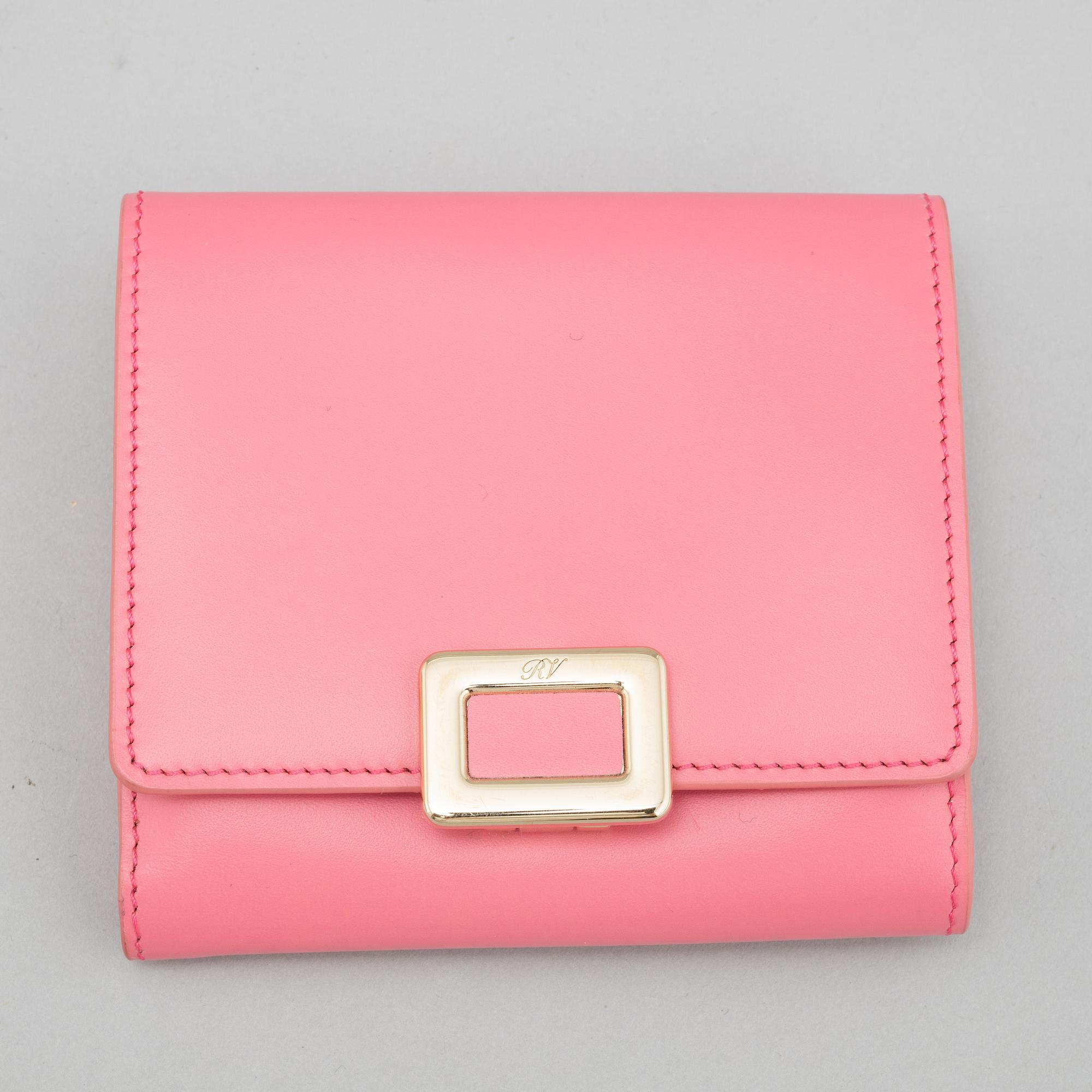 Roger Vivier, a pink leather wallet.