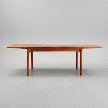 A dining table and six chairs by Henning Kjaernulf, Vejle, second half of the 20th Century.