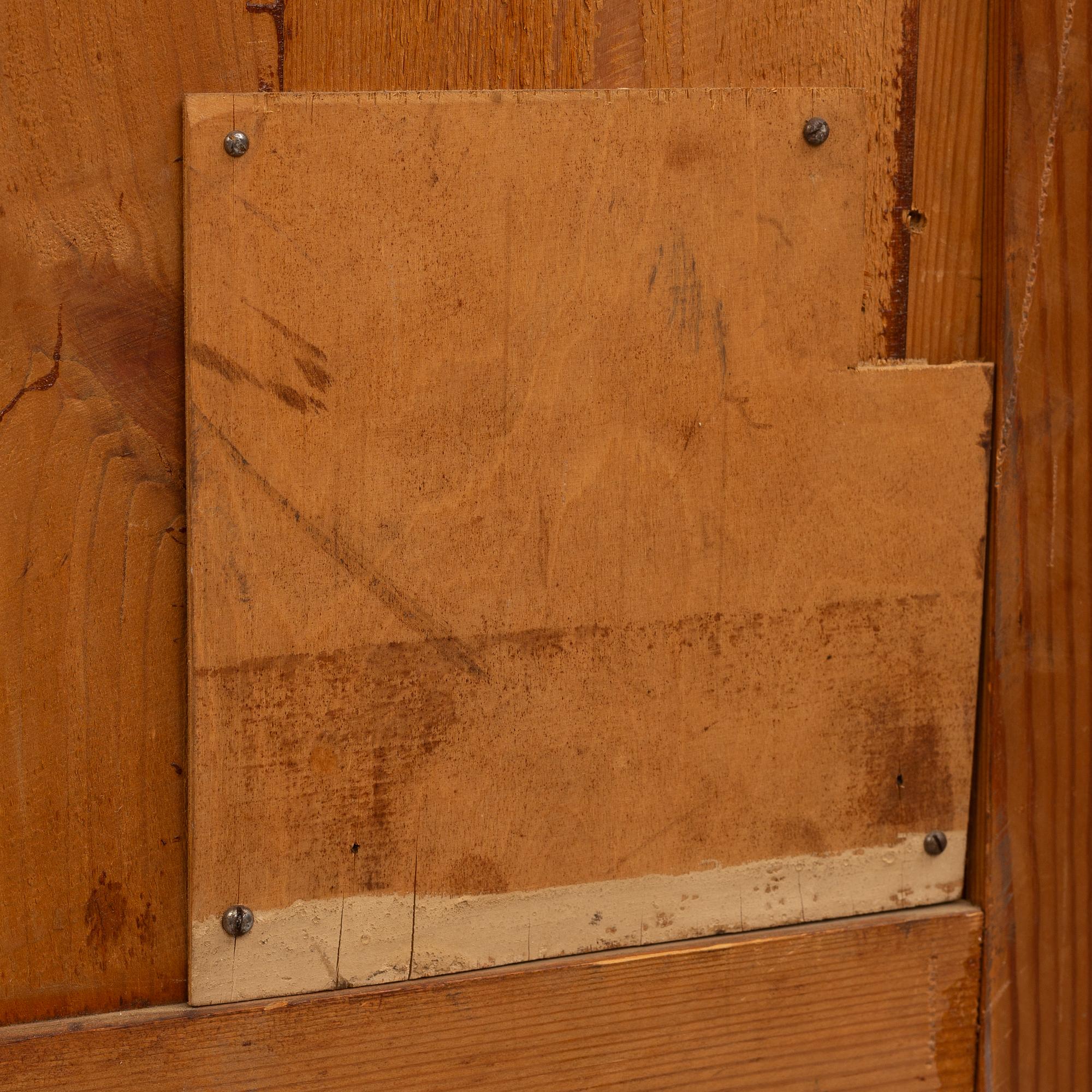 A corner cabinet, circa 1900.