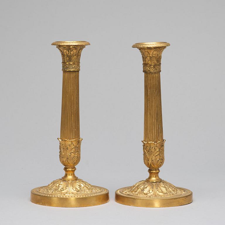 A pair of French Empire-style late 19th ct candlesticks.