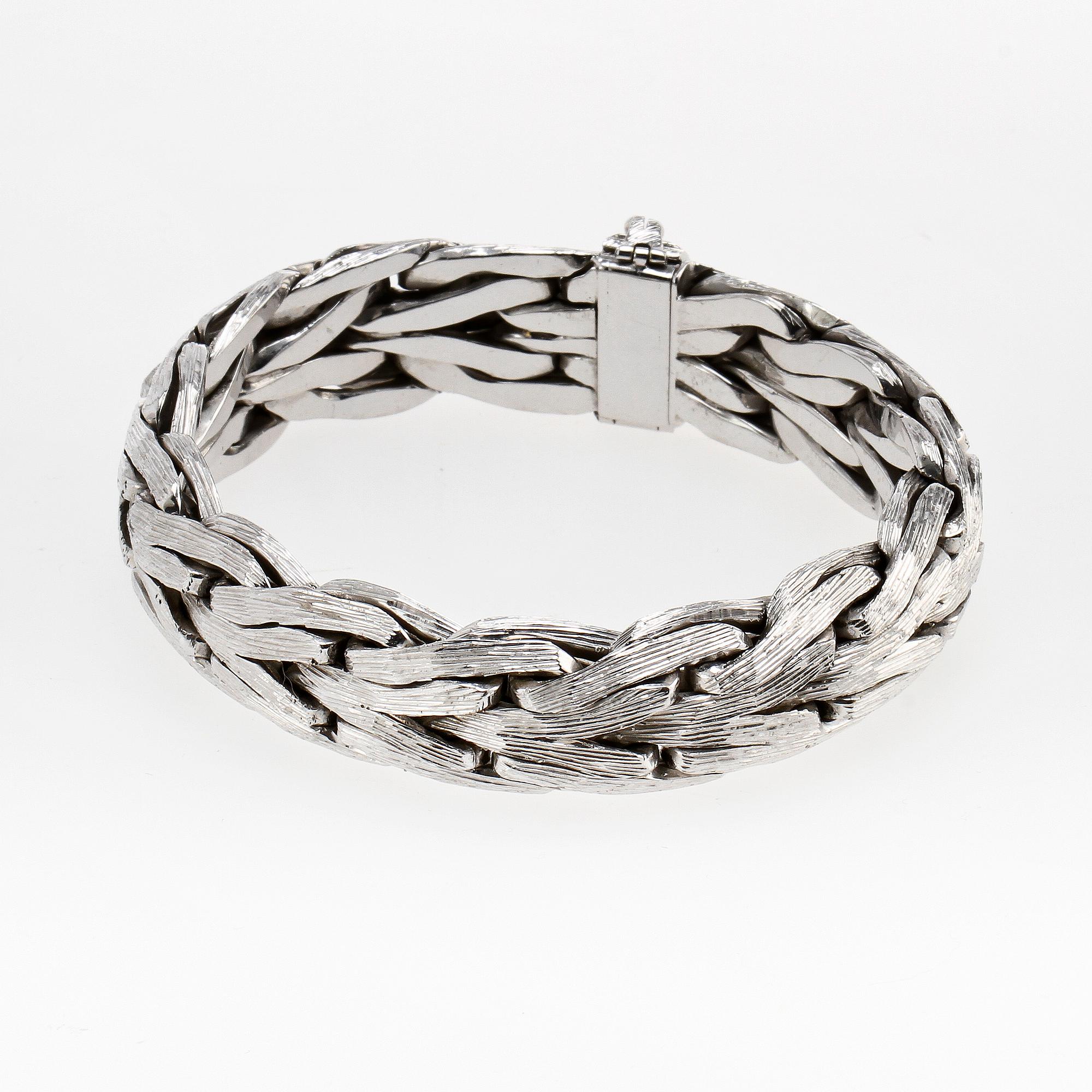 ARMBAND, 18k vitguld, sign EM. Vikt 169 g.