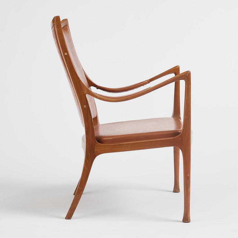 Hans Asplund, a walnut and leather easy chair, Nordiska Kompaniet, ca 1955, for the Nordiska Kompaniet beauty salon.