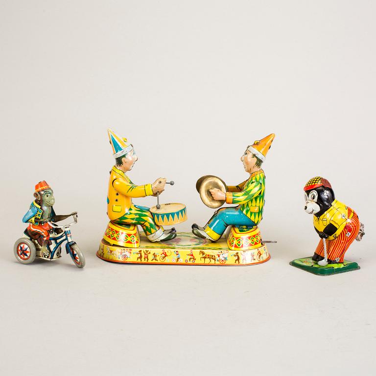A lot of three tinplate toys Japan and Germany 1950s.