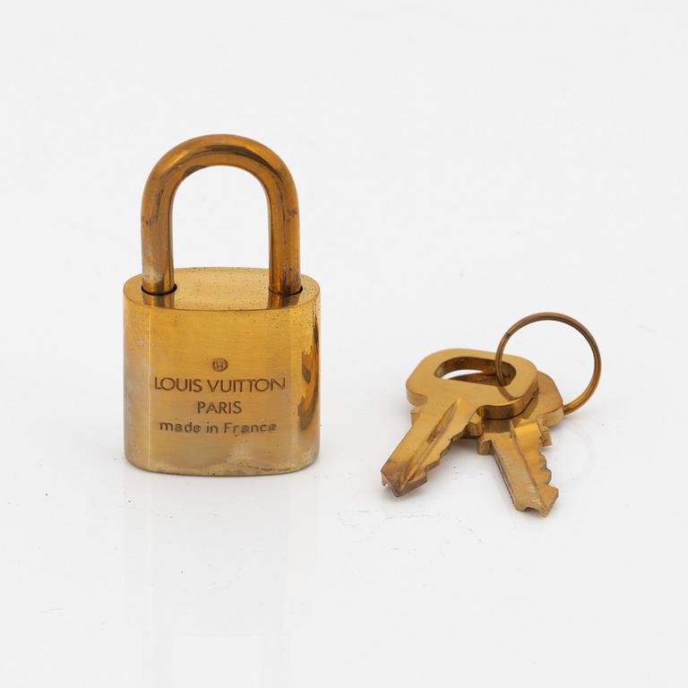 Louis Vuitton, 10 brass padlocks.