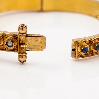 A ca. 22K gold bracelet with sapphires and pearls. Marchesini, Firenze Roma.