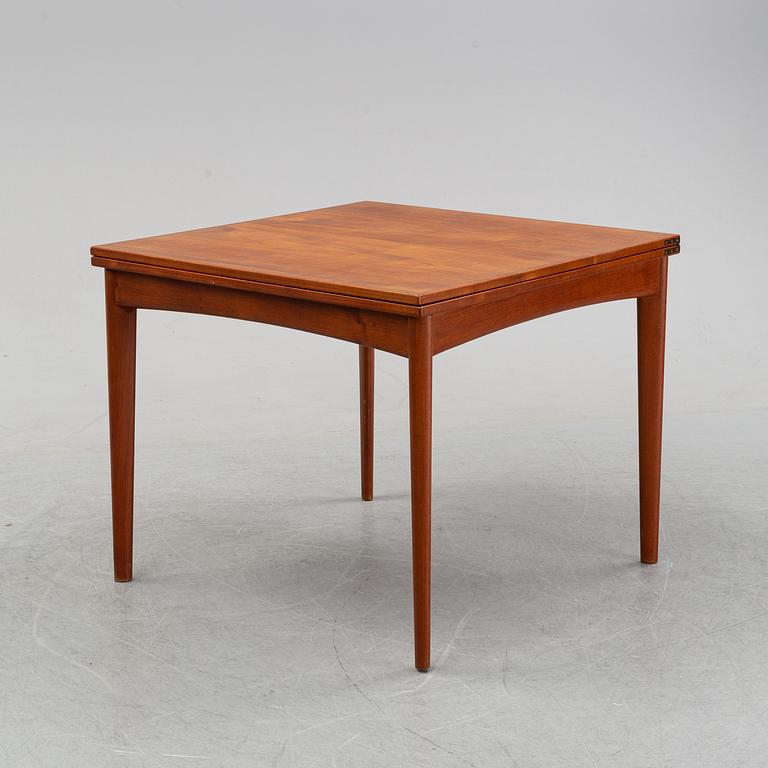 A teak dining group, table and six chairs model no. 49, designed by Erik Buch, Denmark, in 1949.