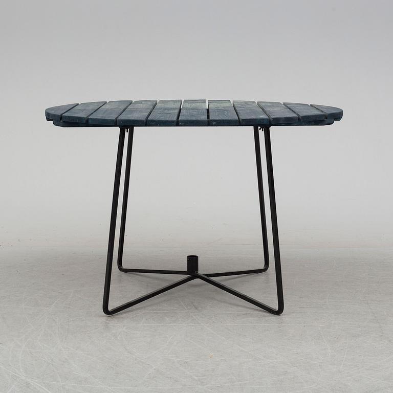 A mid 20th Century garden table from Grythyttan.