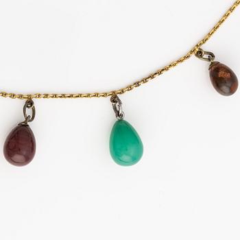 Collier med smyckesägg, 14K guld och metall.