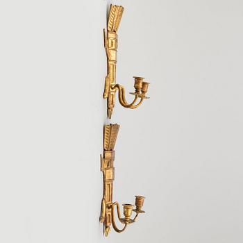 A pair of 19th century carved wall sconces.