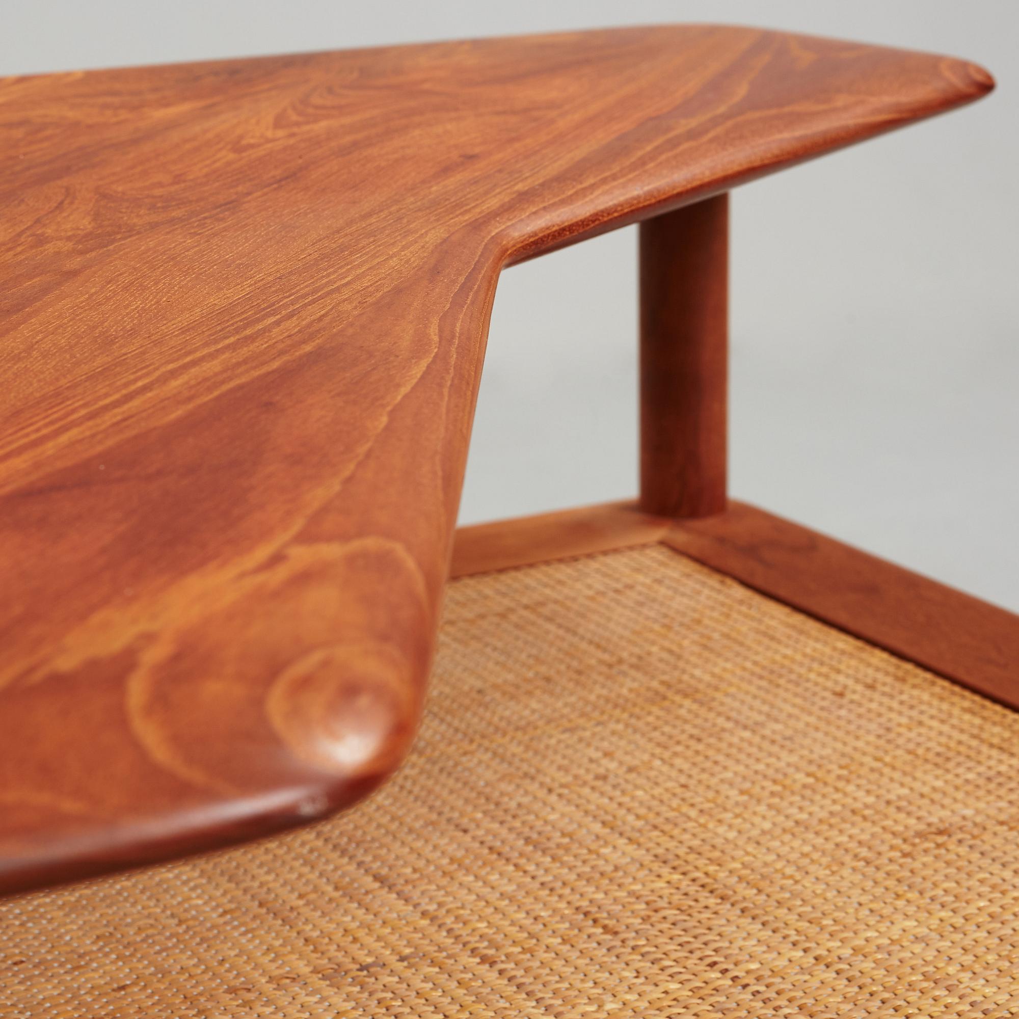 A set of two Danish 'Minerva' sofas with a table for France & Daverkosen.