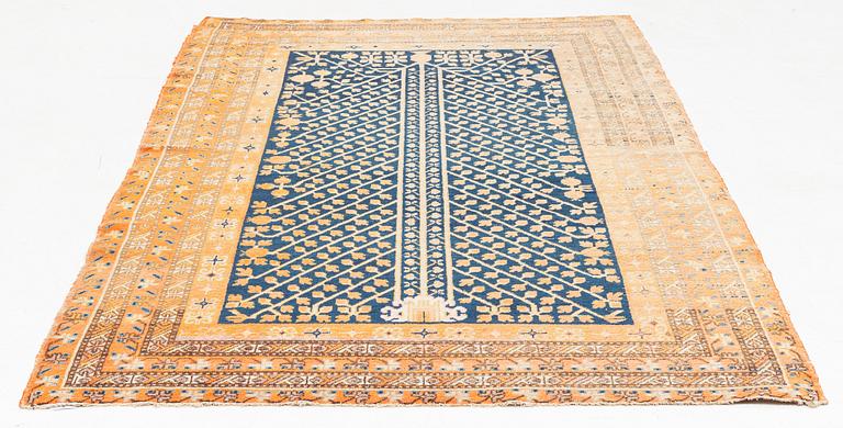 An antique Khotan carpet, Xinjiang area, China, ca 272 x 155 cm.