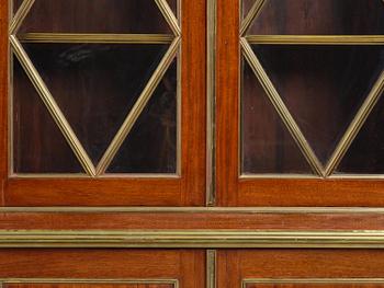 A pair of Russian mahogany and brass-mounted Jacob-style bibliothèques, modern with old parts.