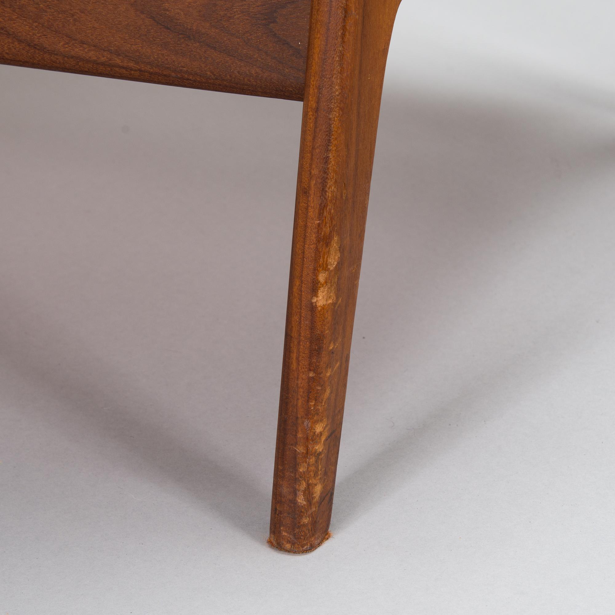 A pair of mid 20th century armchairs.