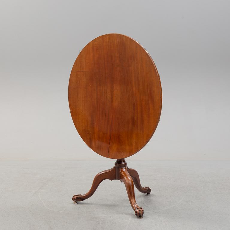 An 18th Century mahogany table.