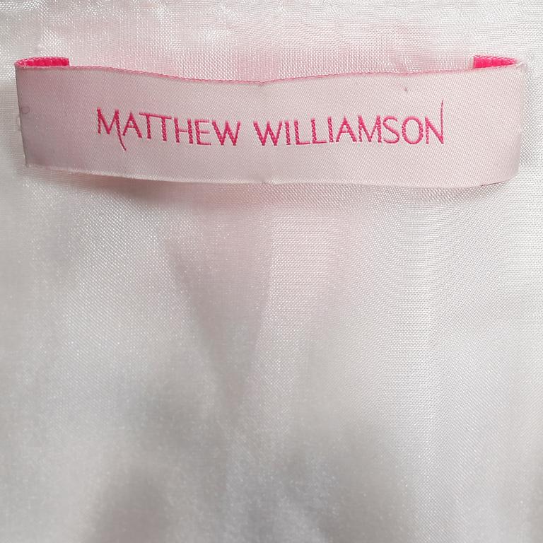 MATTHEW WILLIAMSON, a white silk tunic.