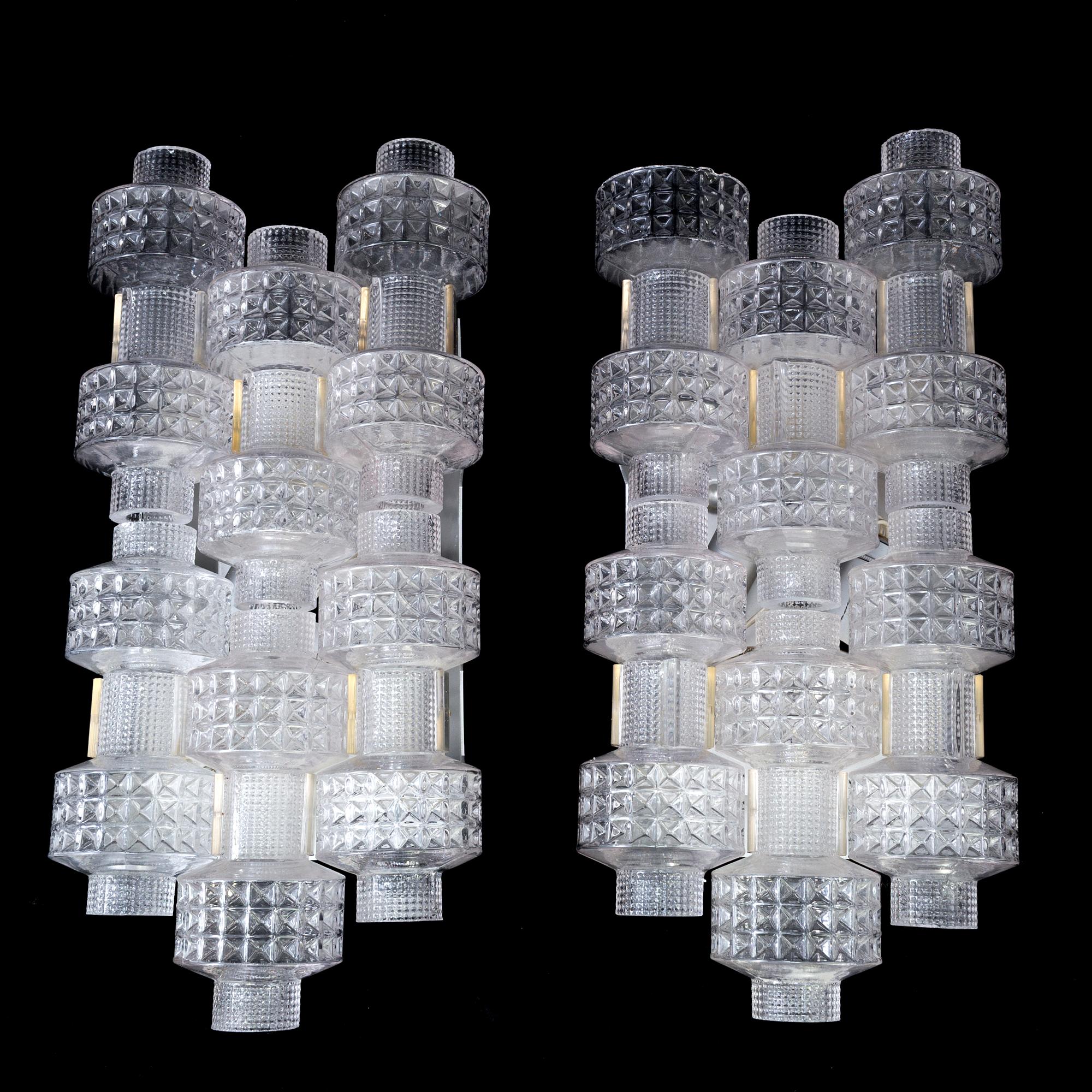 A pair of wall lamps by Gert Nyström for Fagerhult, second half of the 20th century.