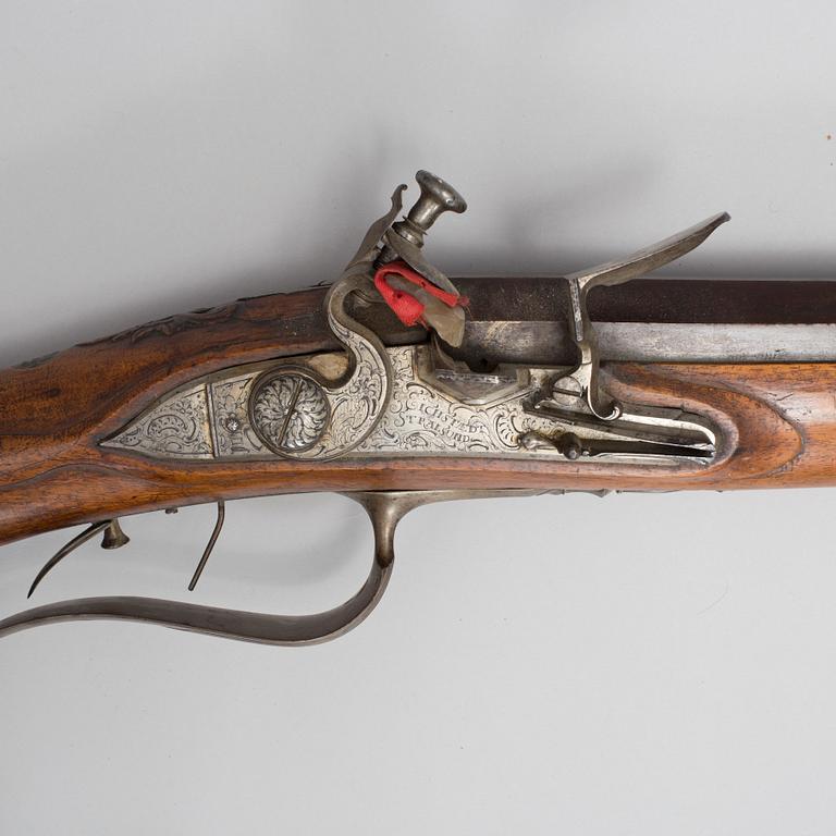 A 18th century flintlock rifle signed Eichstaed, Stralsund.