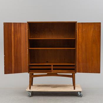 A cabinet veneered with teak designed by Kirke Nielsen for Abrahamssons Möbelfabrik in Smålands Taberg, 1950´s.
