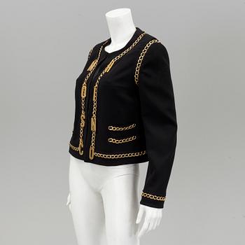 A jacket by Moschino, in size 44 (IT).