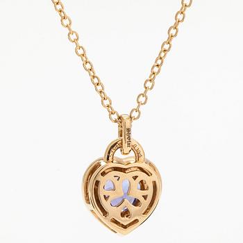 An 18K gold necklace, with a heart-shaped tanzanite and brilliant-cut diamonds.