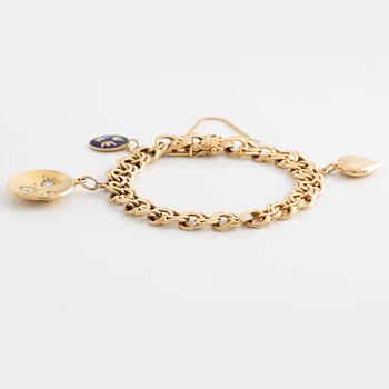 An 18K gold charm bracelet, one charm set with round brilliant-cut diamonds.