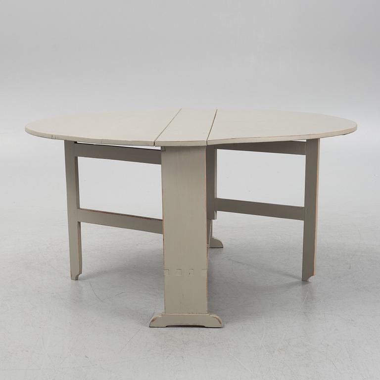A painted gate-leg table, 19th Century.