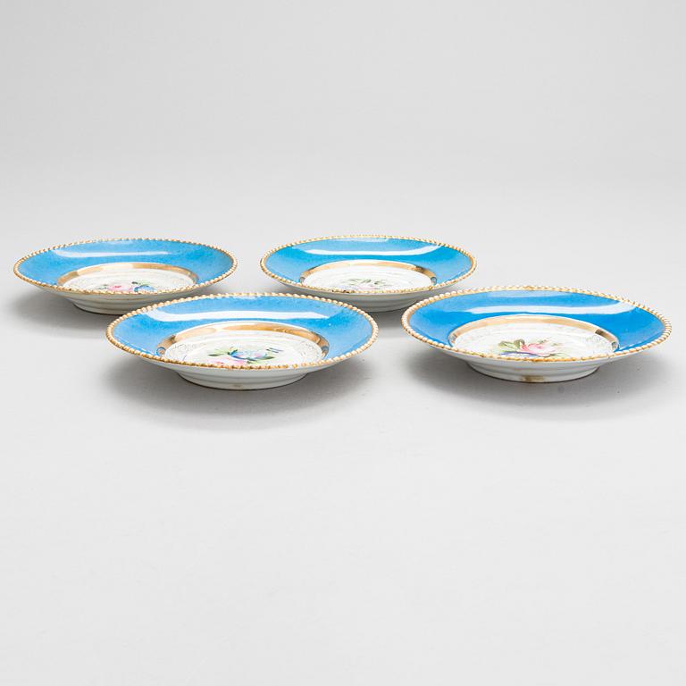A set of four Kuznetsov porcelain plates, 1900-1917.