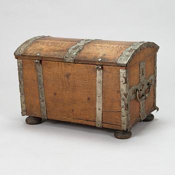 An oak wood chest dated 1710.