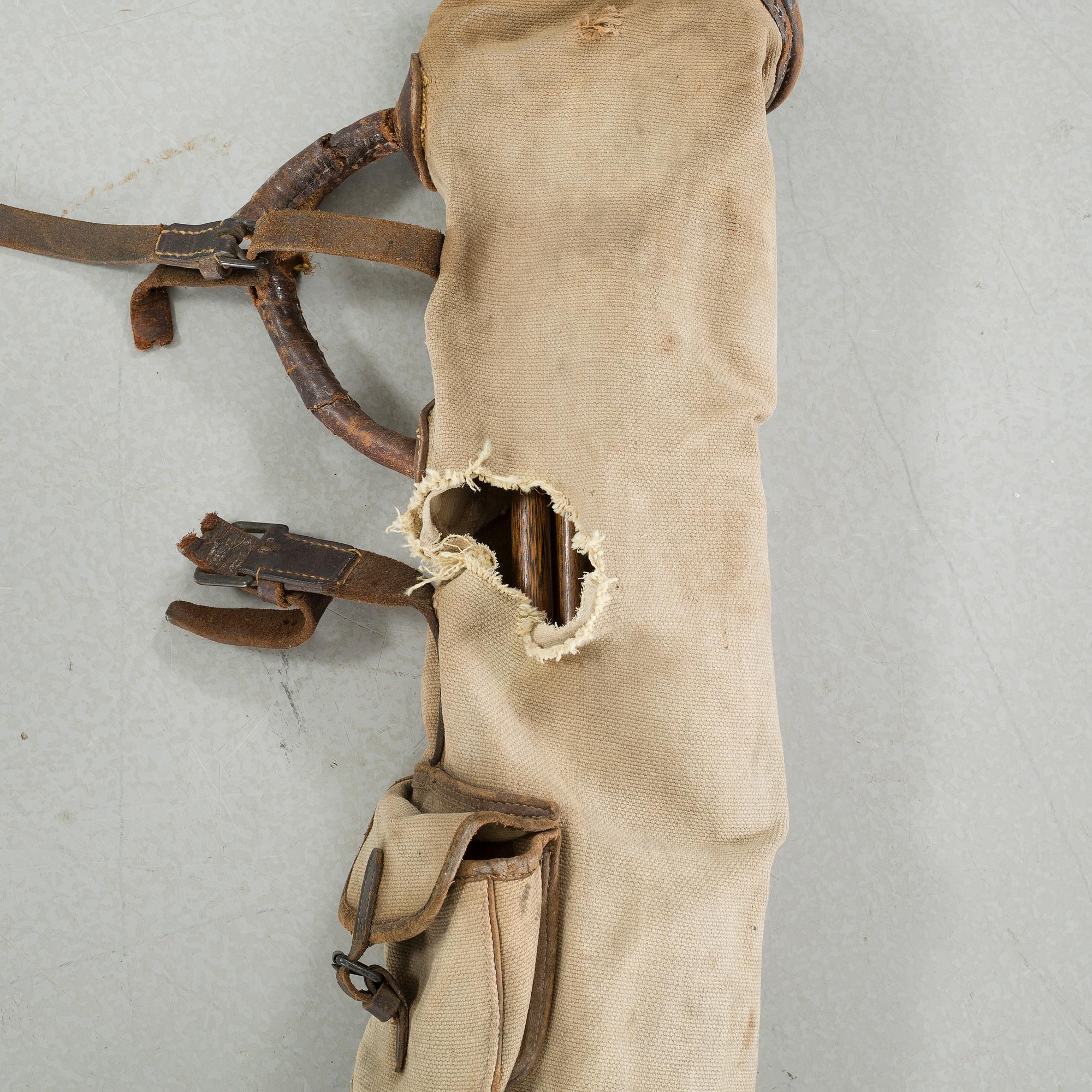 Seven golf clubs with bag, clubs by by "J Winton" & "Josh Taylor",, first half of the 20th century.