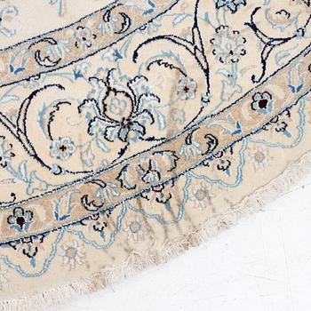 A Nain rug, diameter a. 247 cm.