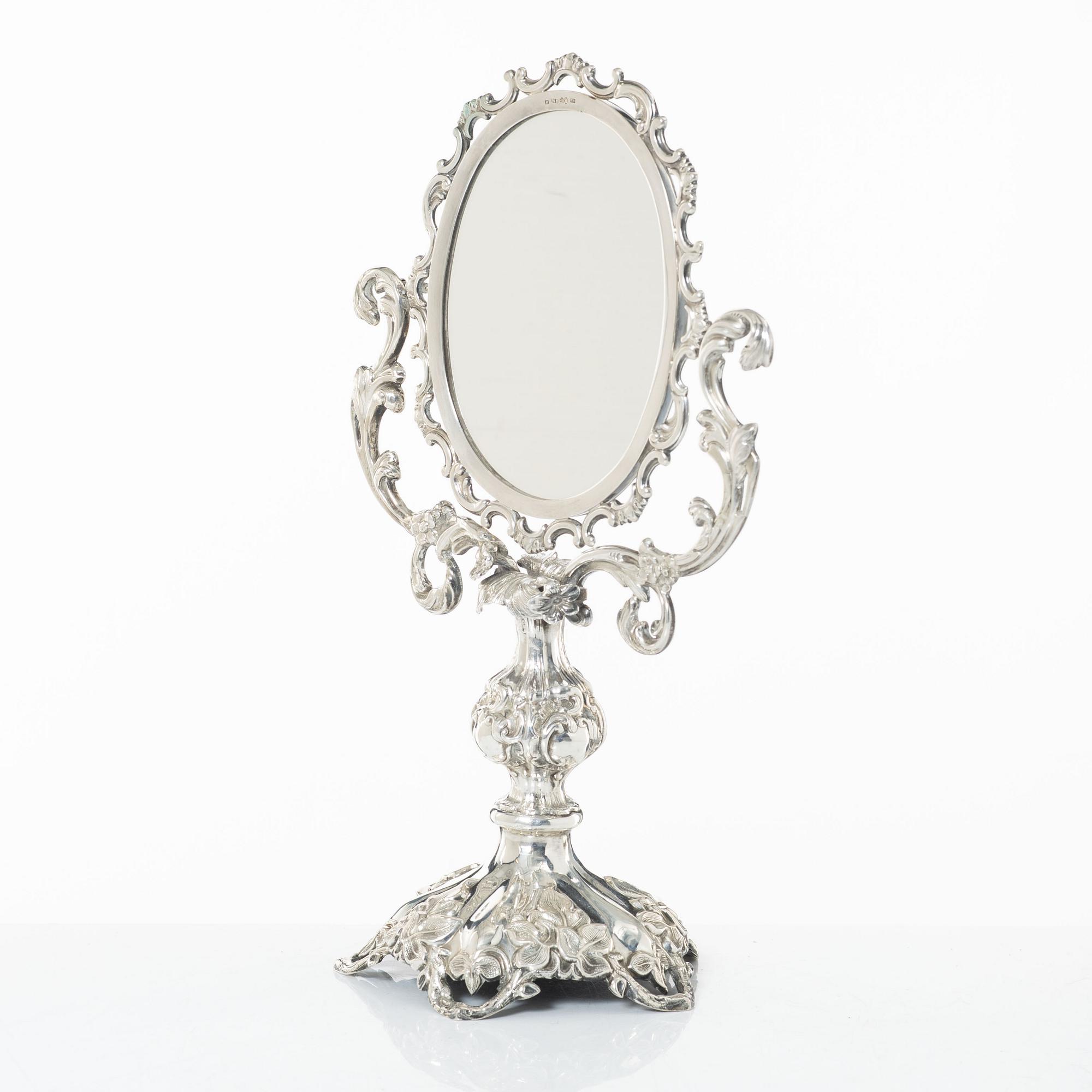 A Swedish silver dressing table mirror on stand, mark of Gustaf Möllenborg, Stockholm 1856.