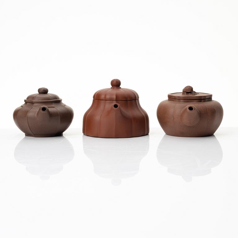 A group of three yixing teapots, China, 1980s.