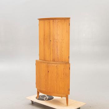 A 1950/60s pine corner cabinet.