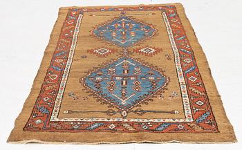 An antique Sarab rug, northwestern Iran, c. 213 x 107 cm.